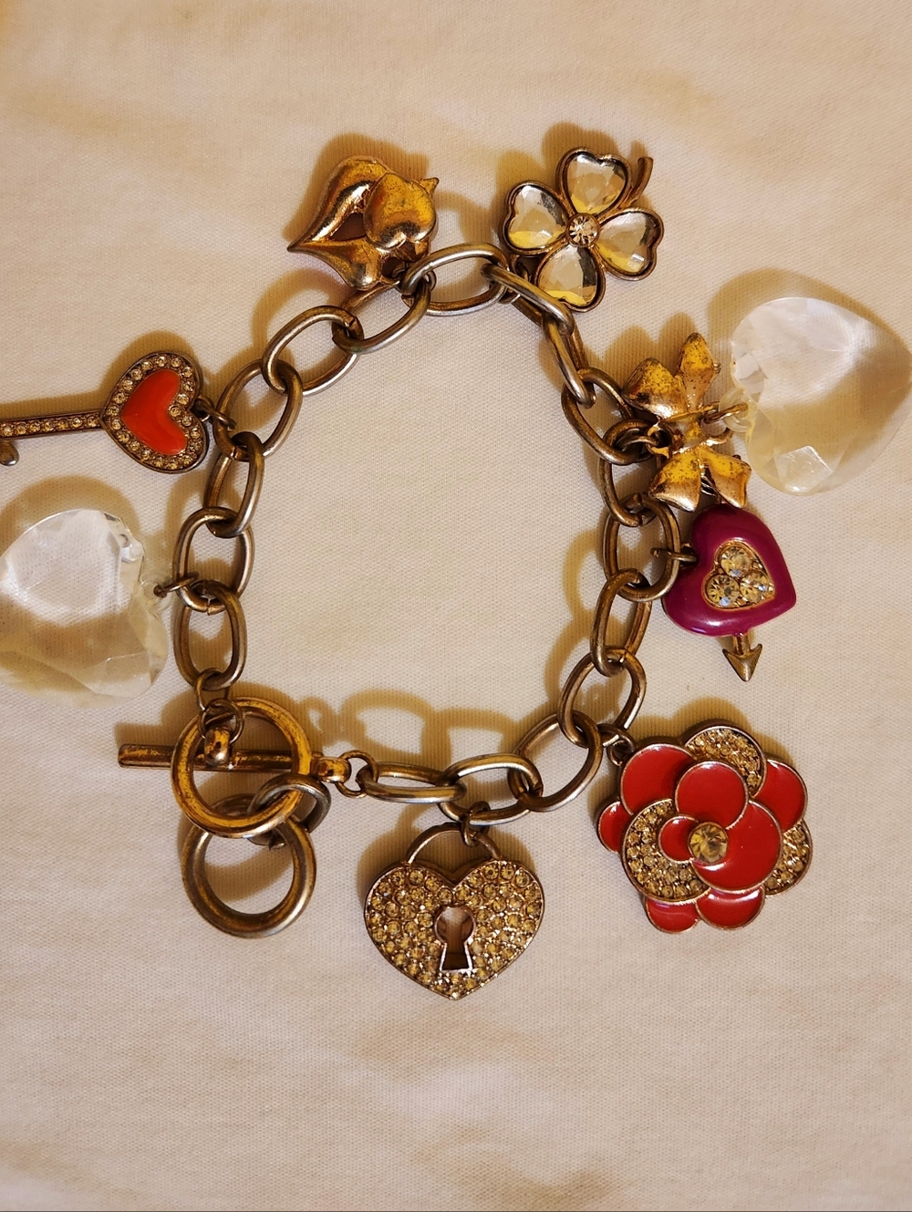 Gold-Tone Charm Bracelet with Red Enamel Flower and Heart Charms
